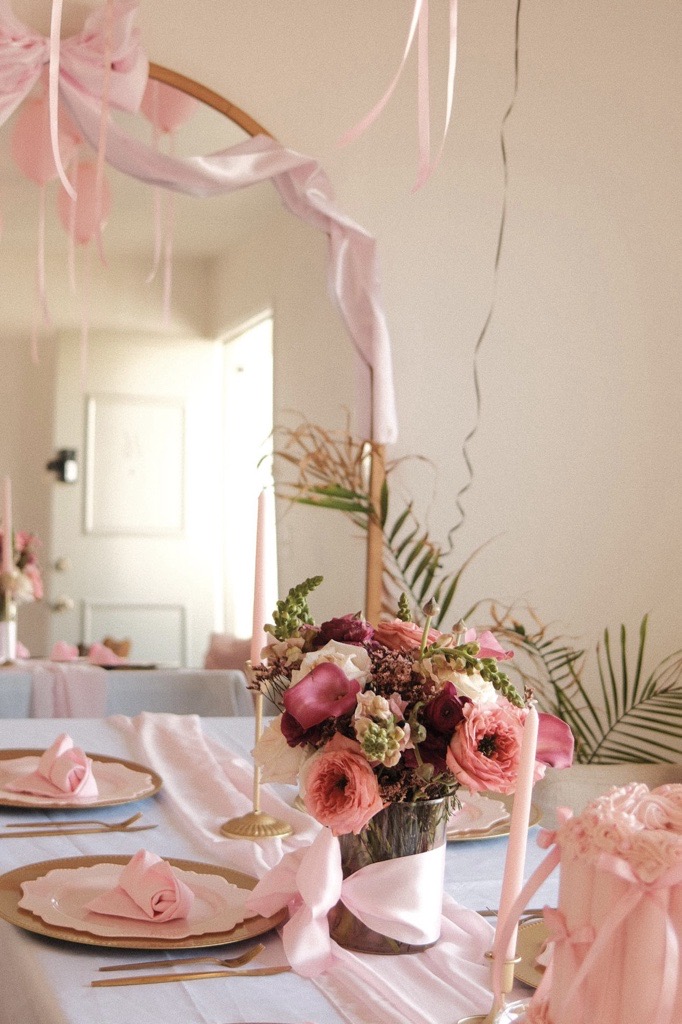 Compote centerpiece with garden roses